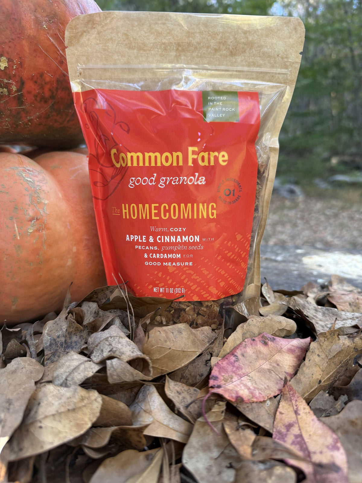 The Homecoming granola bag with pumpkins and fall leaves